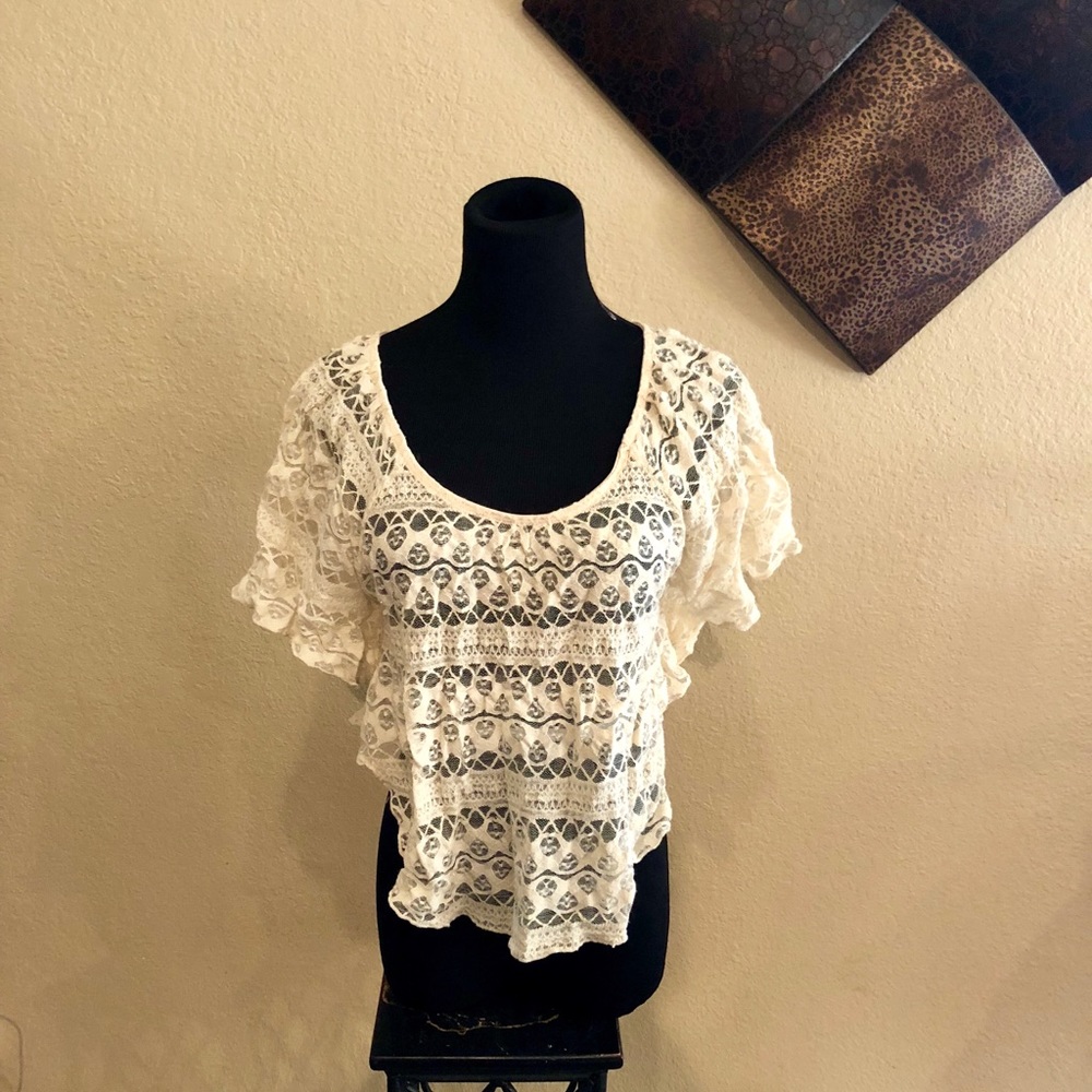 Love this little lace top.  Cropped, size small
